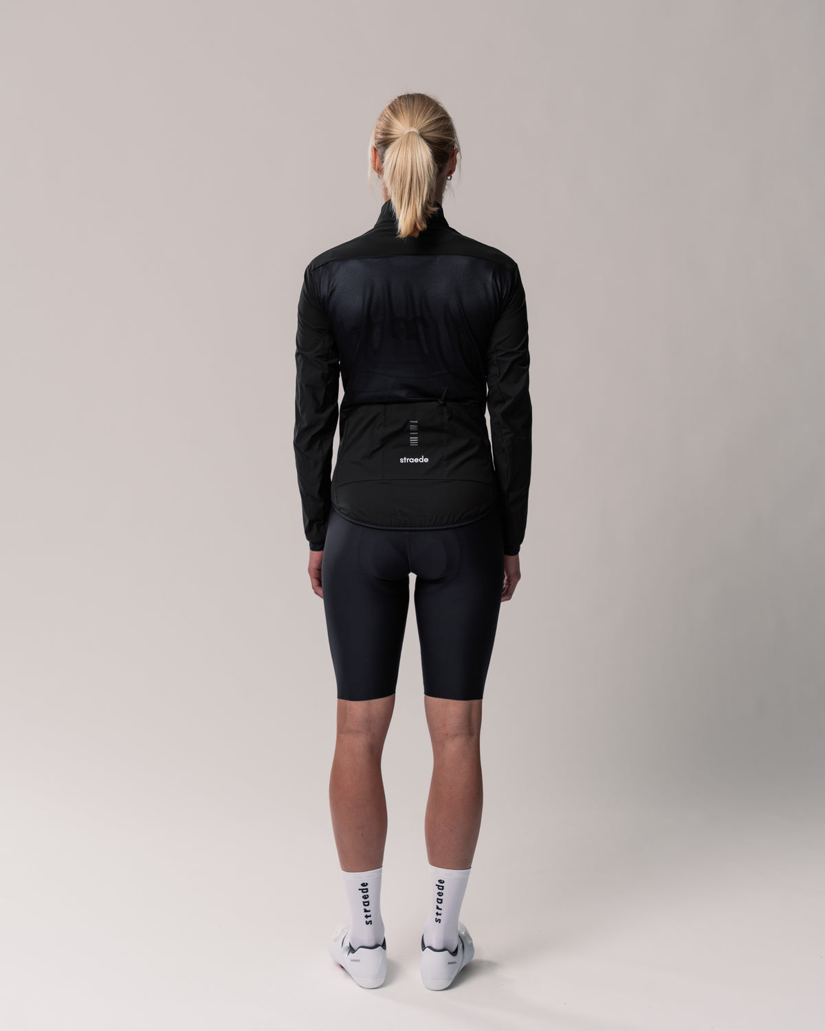 Windbreaker für Damen in schwarz Mesh-Rückseite mit Trikot-Rückentaschen