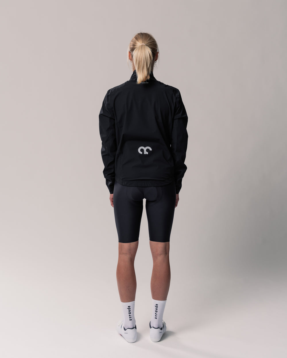 #farbe_black | winddichte Regenjacke für Damen in schwarz Rückseite